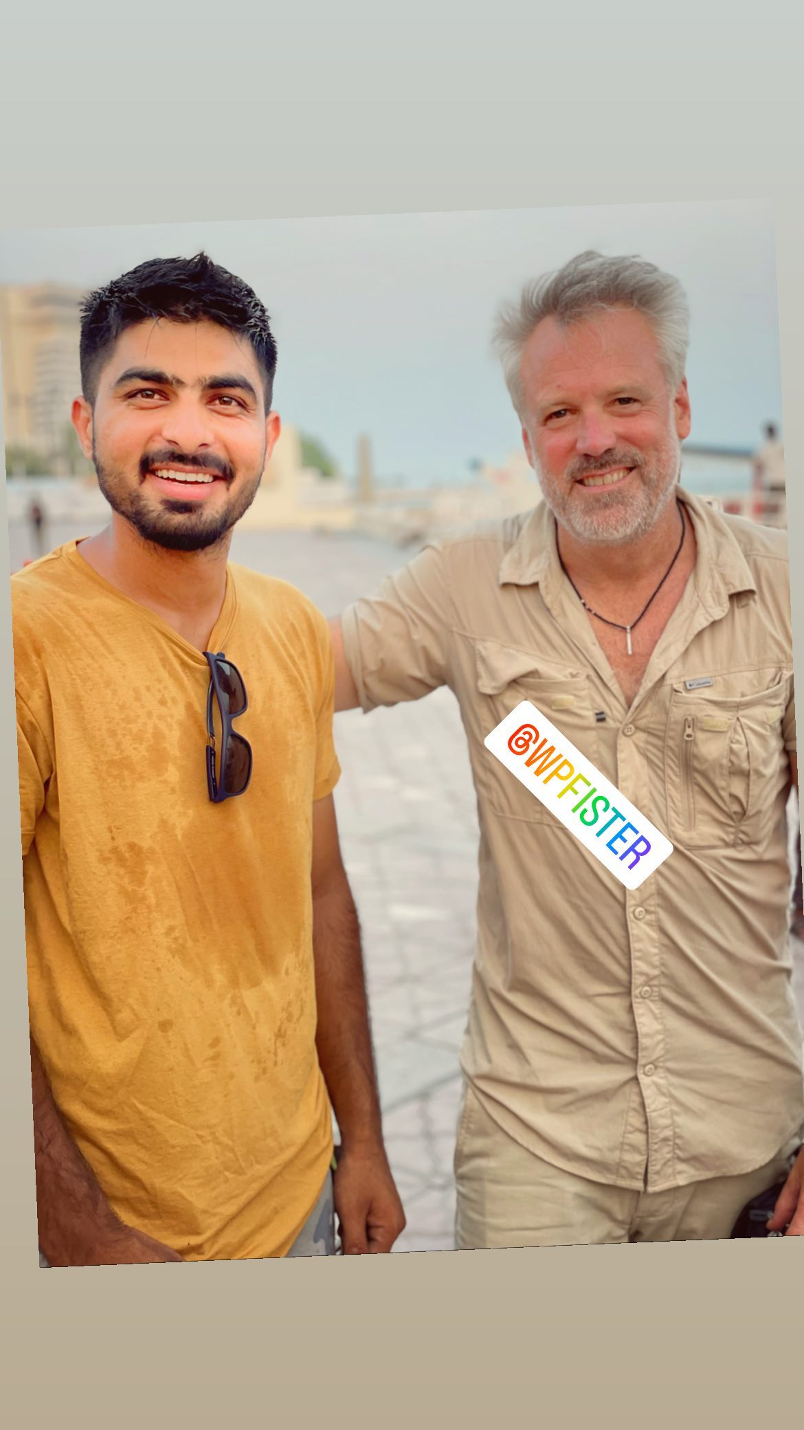 Umair Alam with director Wally Pfister on set